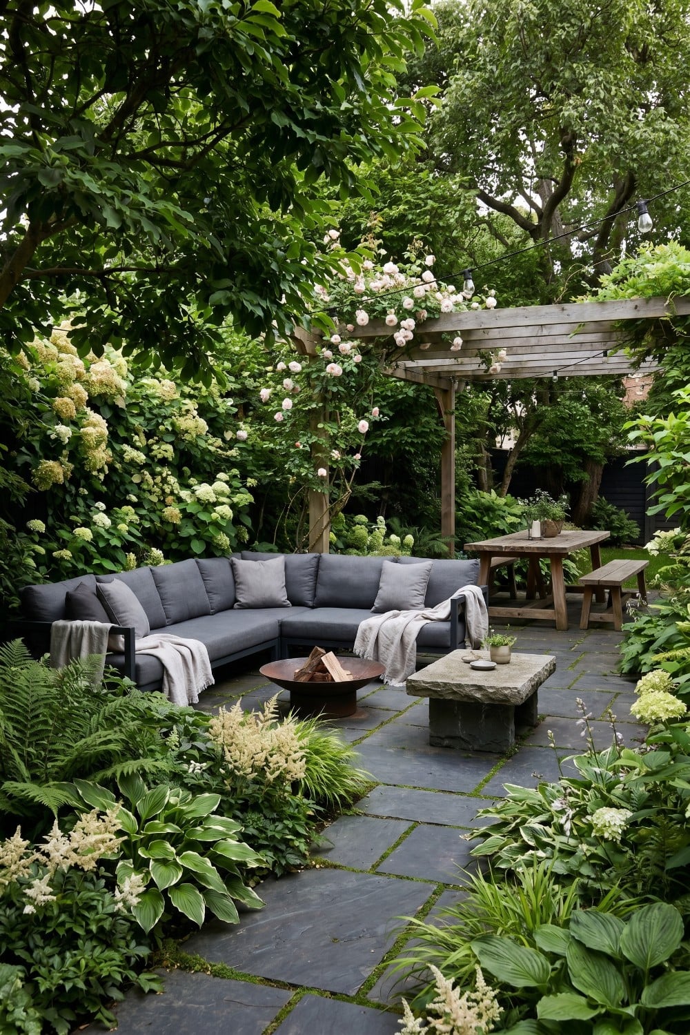 Charcoal sofa and slate pavers on shady patio