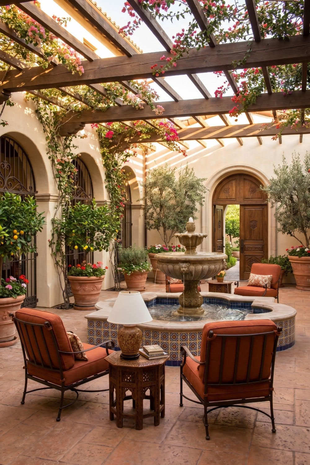 Spanish Patio with Potted Lemons and Orange Seating