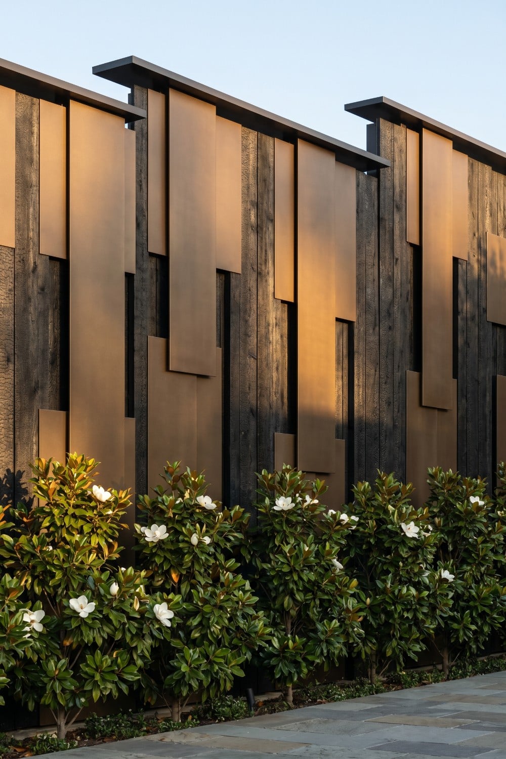 Bronze Geometric Panels on Tall Privacy Fence